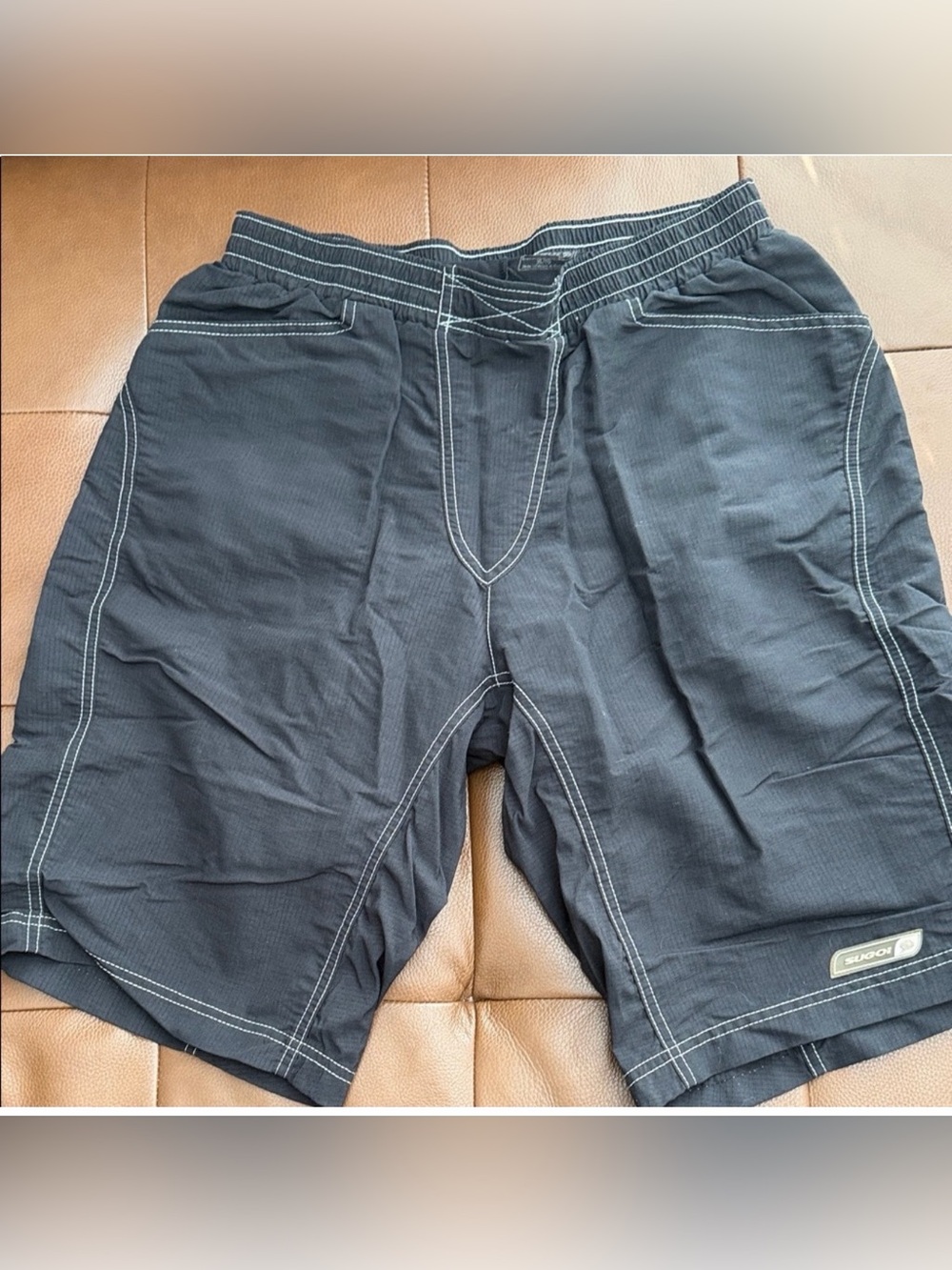 SUGOI Black Shorts with White Contrast Stitching